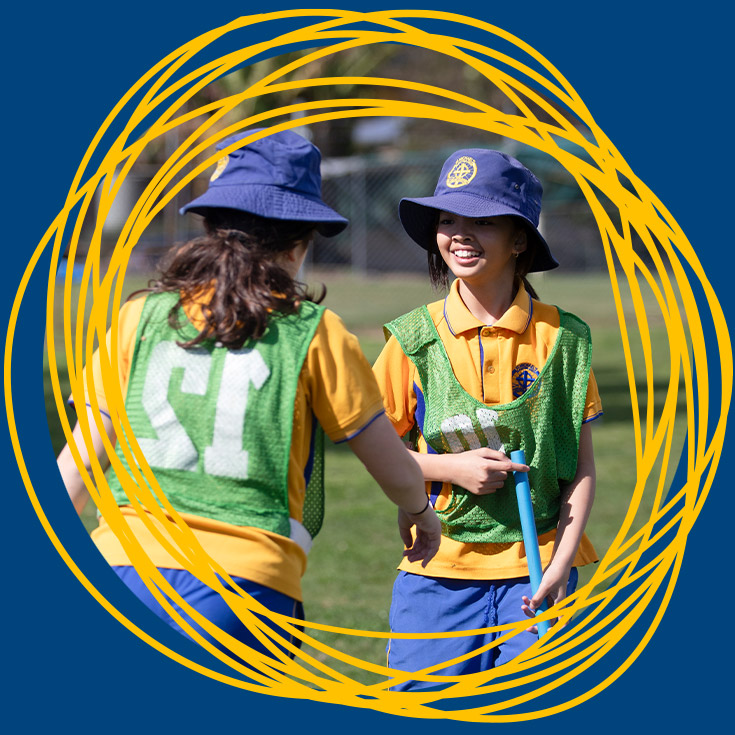 Students playing sport on the school oval at St Michael's Primary School Blacktown South