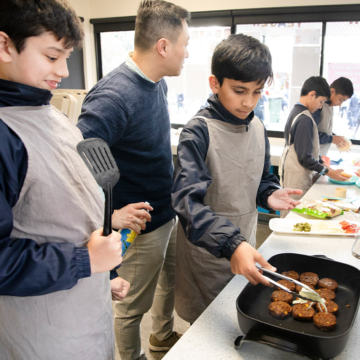 Students cooking together in class at St Michael's Primary School Blacktown South