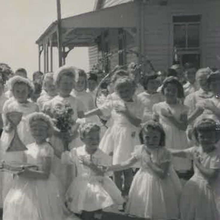 Historical photo of students performing a dance where they attended St Michael's Primary School Blacktown South